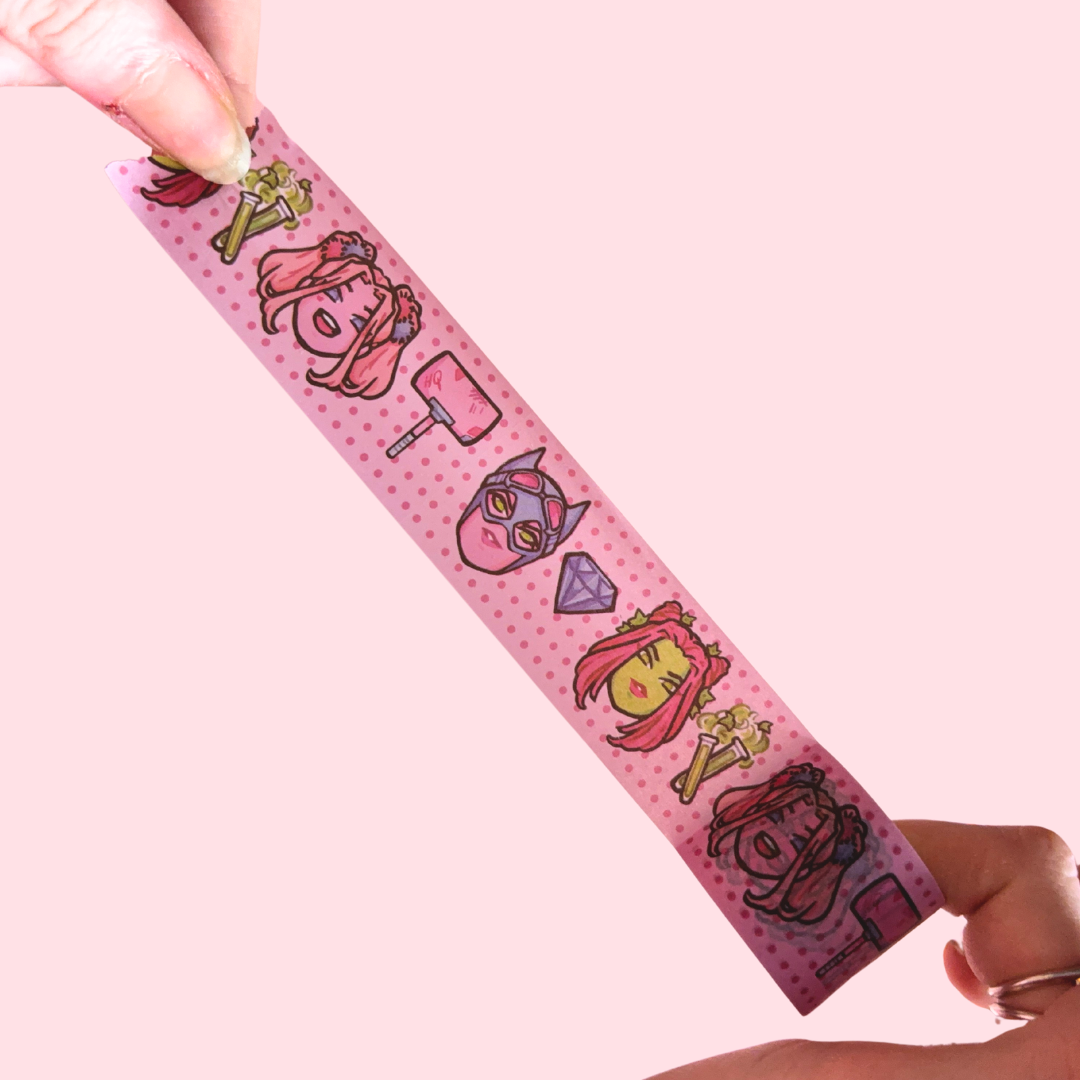 Pink washi tape with cartoon character designs on a pink background