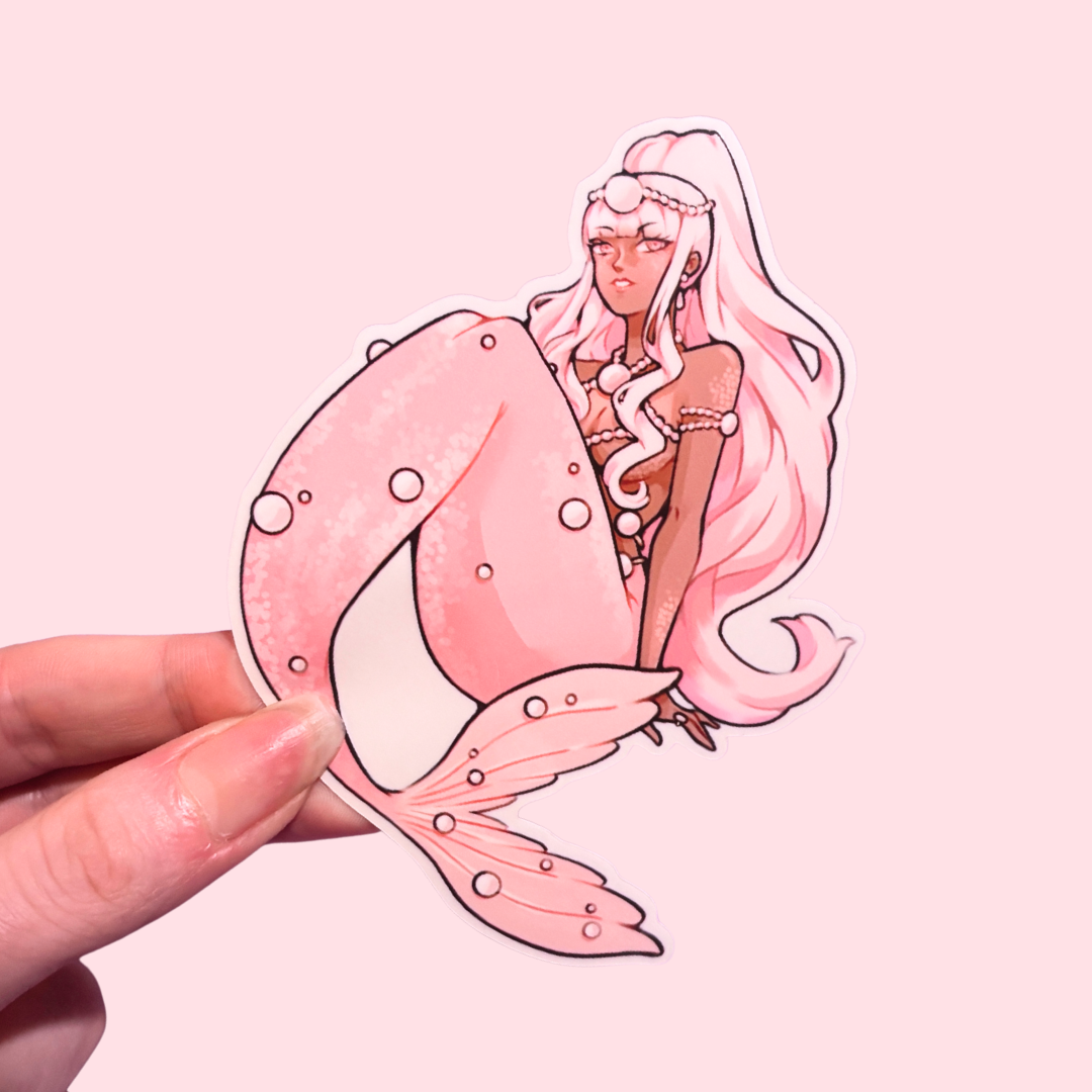Sticker of a mermaid with pink hair and tail held against a pink background