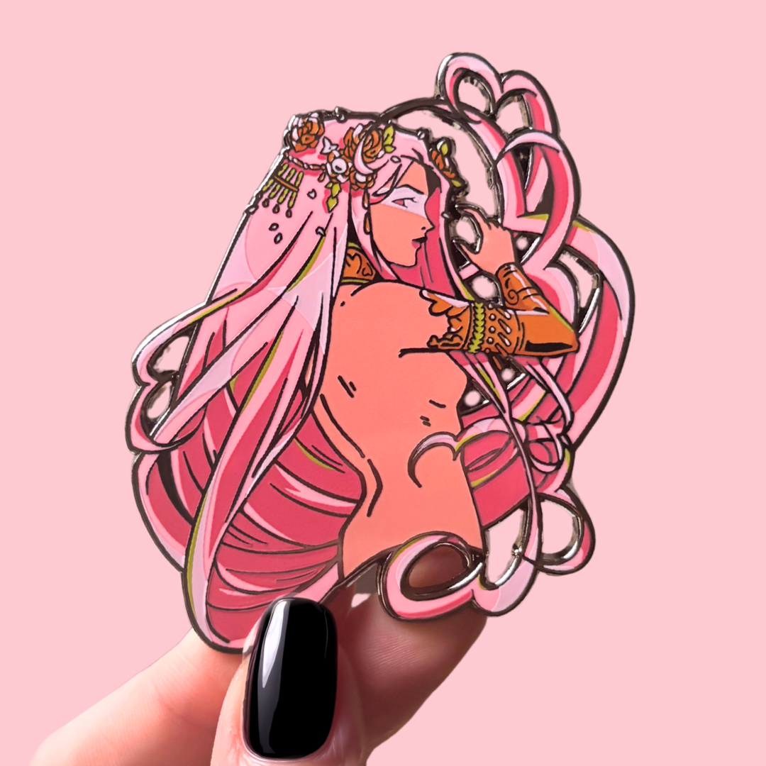 Illustrated character enamel pin with pink hair on a pink background