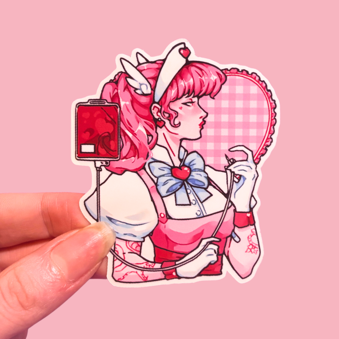 Sticker of a character with pink hair and a heart-themed outfit held against a pink background