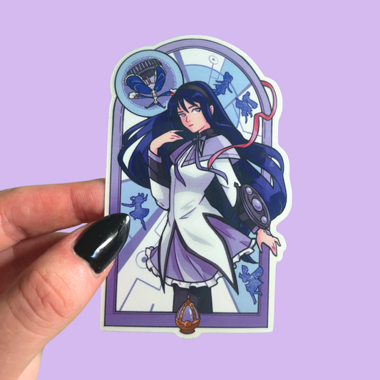 Anime character sticker held by a hand on a purple background