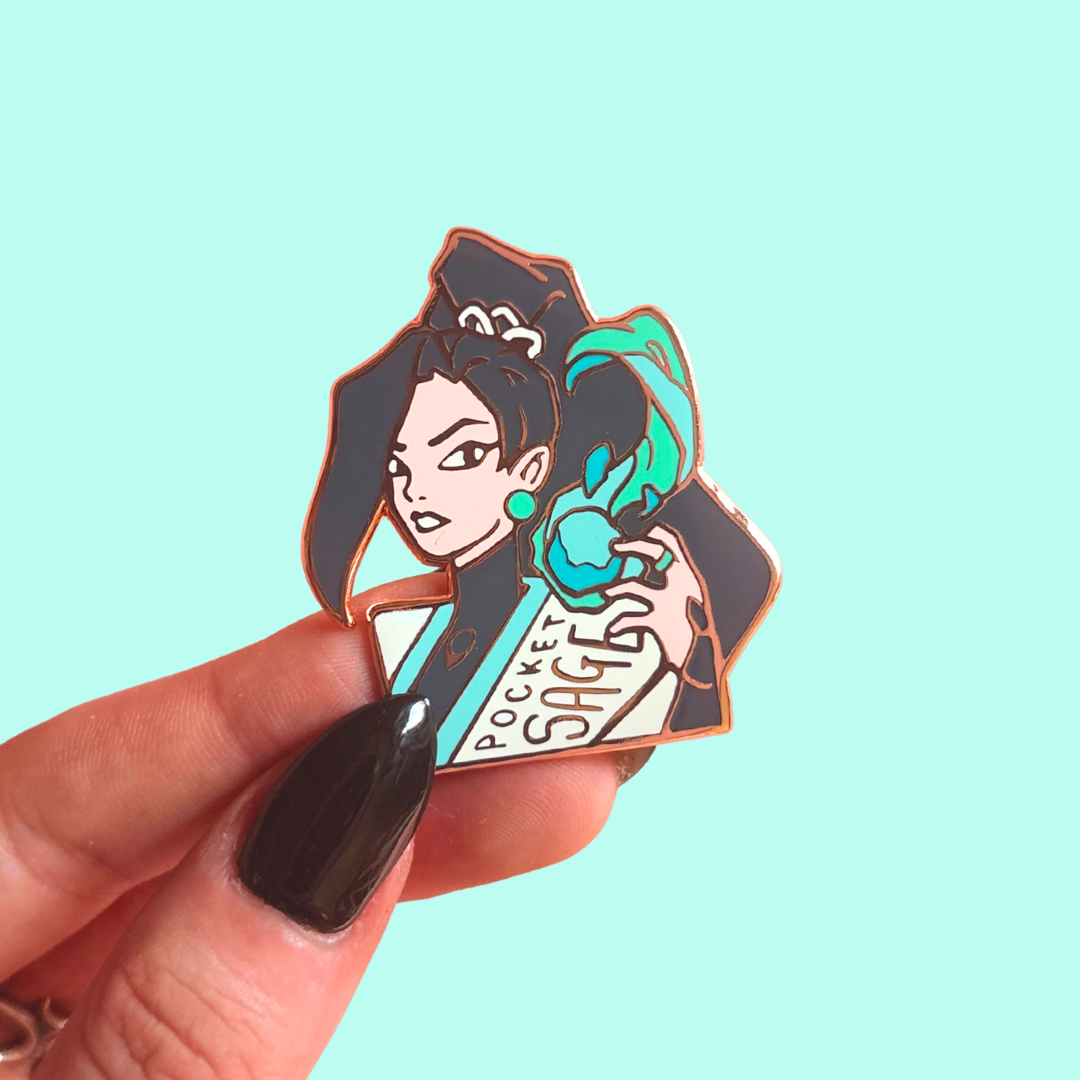 Pin with an illustration of a character with text saying 'Pocket Sage' against a light blue background.