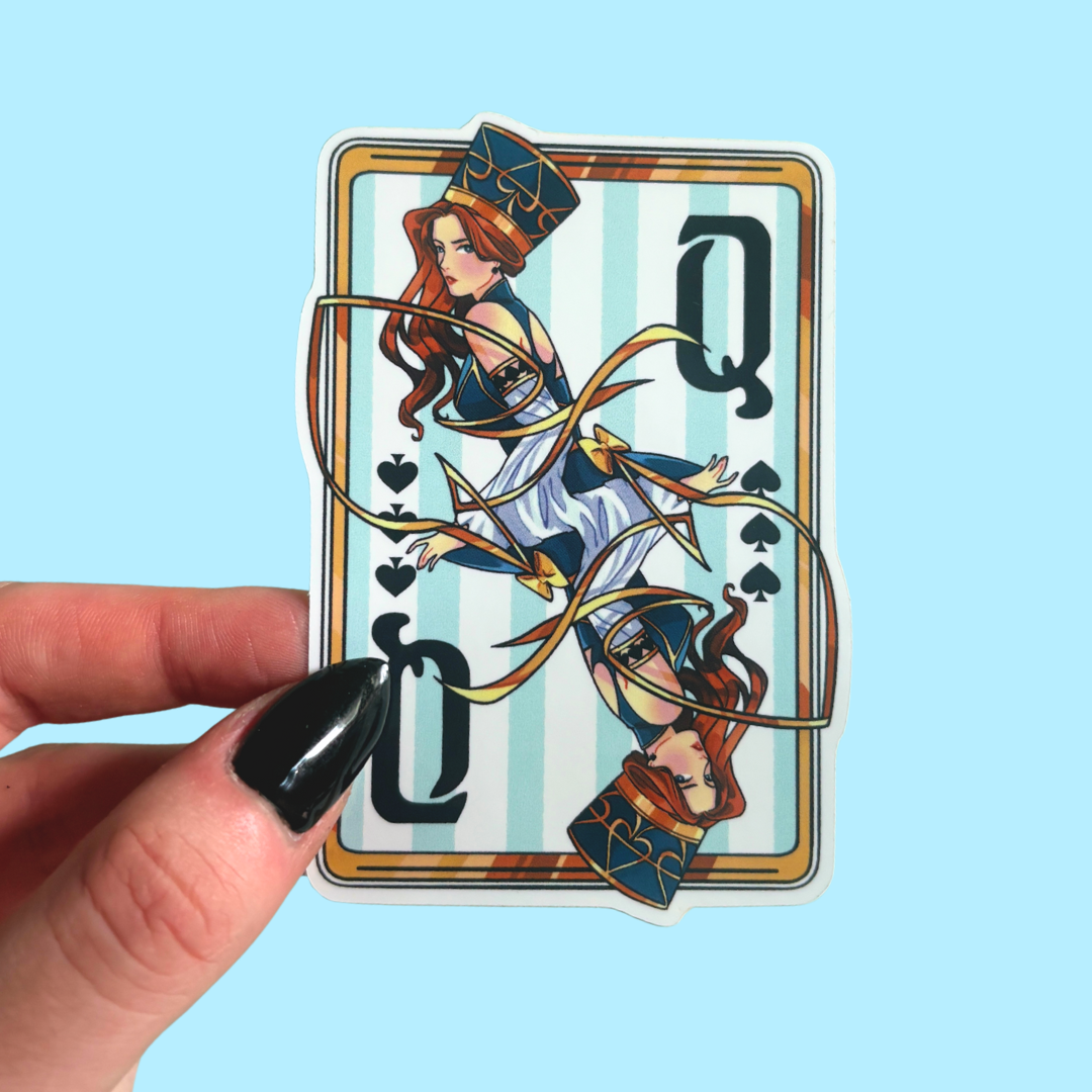 Sticker of a queen from a deck of cards held by a hand against a light blue background