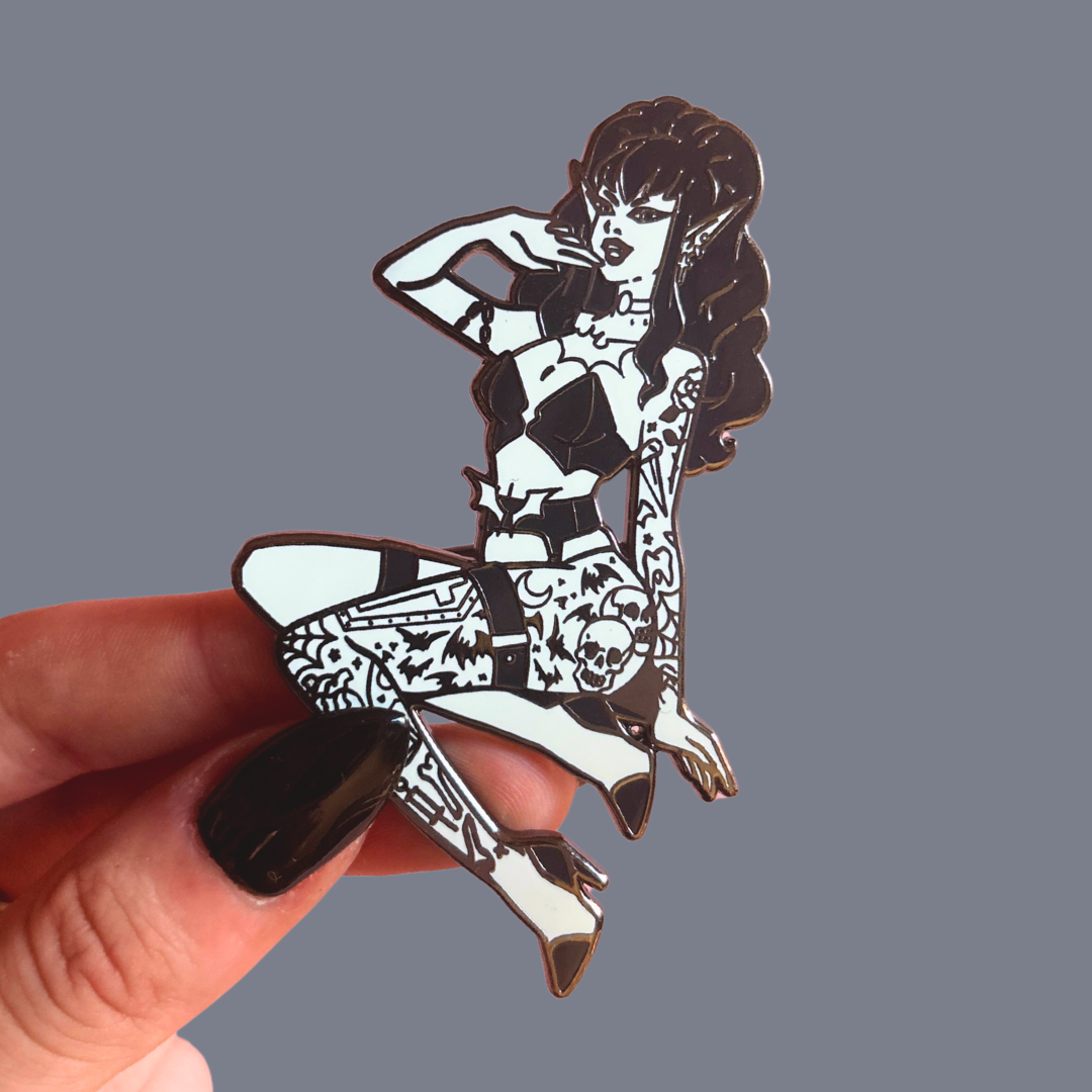 Pin with a stylized illustration of a woman on a gray background