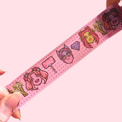 Pink washi tape with cartoon character designs on a pink background
