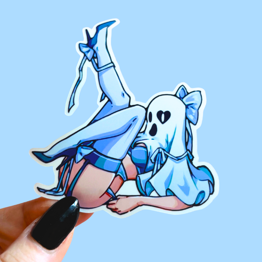 Cartoon character sticker of a ghost in a blue outfit held against a light blue background