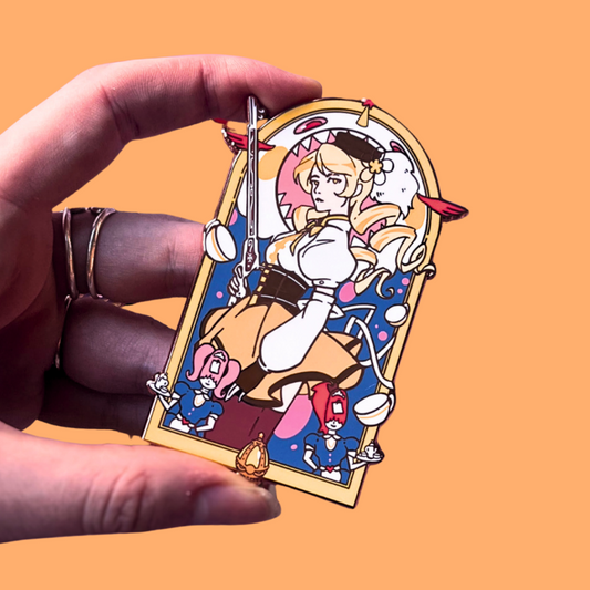 Hand holding a card with an yellow illustrated character pin on a solid background